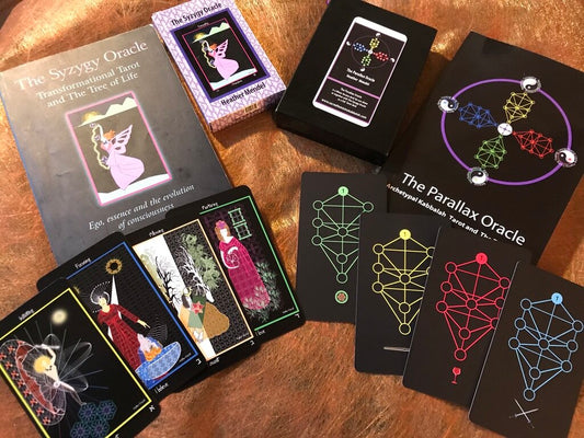 The Syzygy Oracle by Heather Mendel – Kabbalistic Tarot deck exploring ego, essence, and consciousness evolution.

