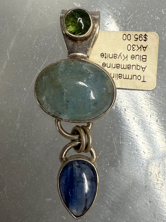 Tourmaline Aquamarine Blue Kyanite Sterling Silver Pendant – vibrant multi-crystal jewelry combining grounding, calming, and intuitive energies.
