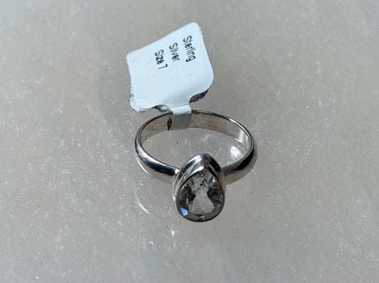 White Faceted Topaz Sterling Silver Ring Size 7 – radiant faceted white topaz set in sterling silver, perfect for elegant and classic jewelry.
