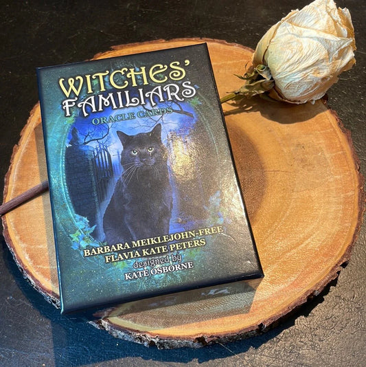 Witches’ Familiar Oracle Cards by Barbara Meiklejohn-Free – a mystical deck featuring animal guides and magical allies for witches.
